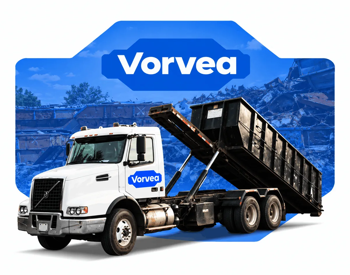 VORVEA collection truck at an industrial scrap yard